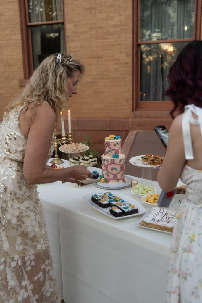 Regency era inspired food table with elegant dishes and vintage decor.